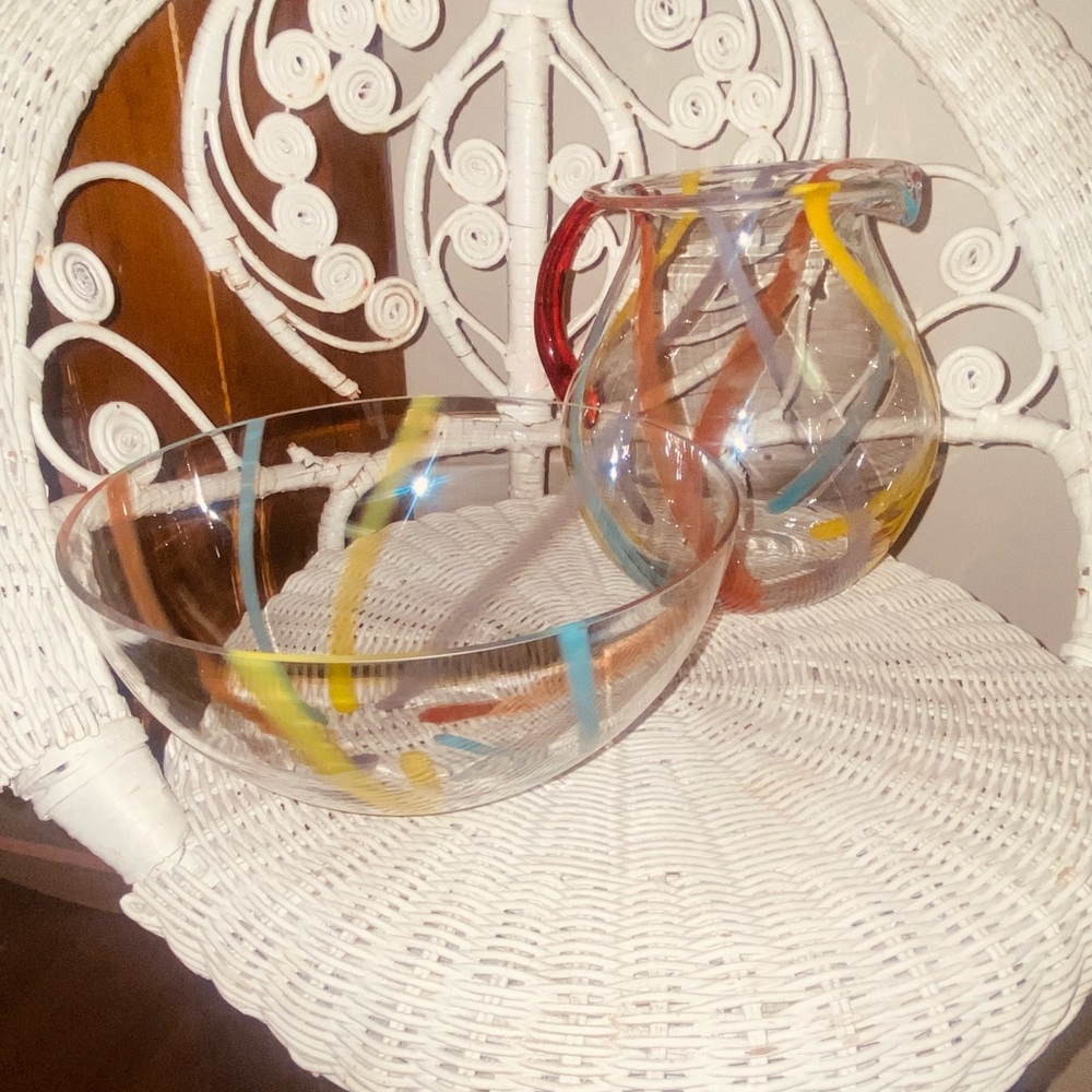 Vintage colorful glass serving bowl and pitcher set.
